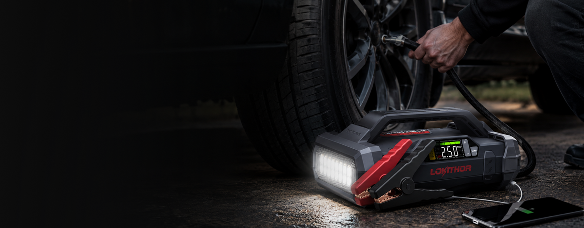 Black and red portable air compressor with led light bar