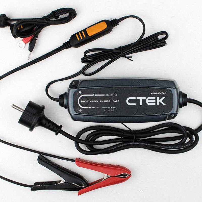 Black CTEK CT5 PowerSport smart 12v superbike battery charger with orange handle and red black clamps for India use