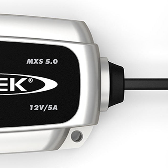 CTEK MXS 5.0 smart trickle charger maintaining a car battery in an Indian garage setup