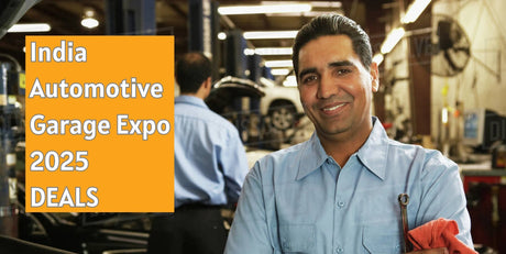 A smiling mechanic in a light blue shirt holds an orange cloth and wrench at india automotive garage expo 2025