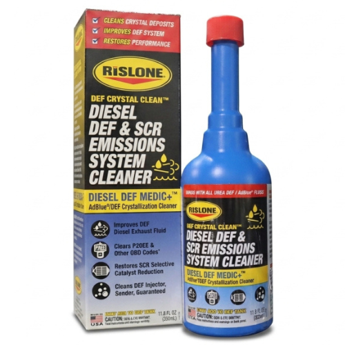 Indian car owner pouring Rislone Crystal Clean AdBlue DEF System Cleaner into a Toyota Fortuner DEF tank in a sunny Mumbai parking lot