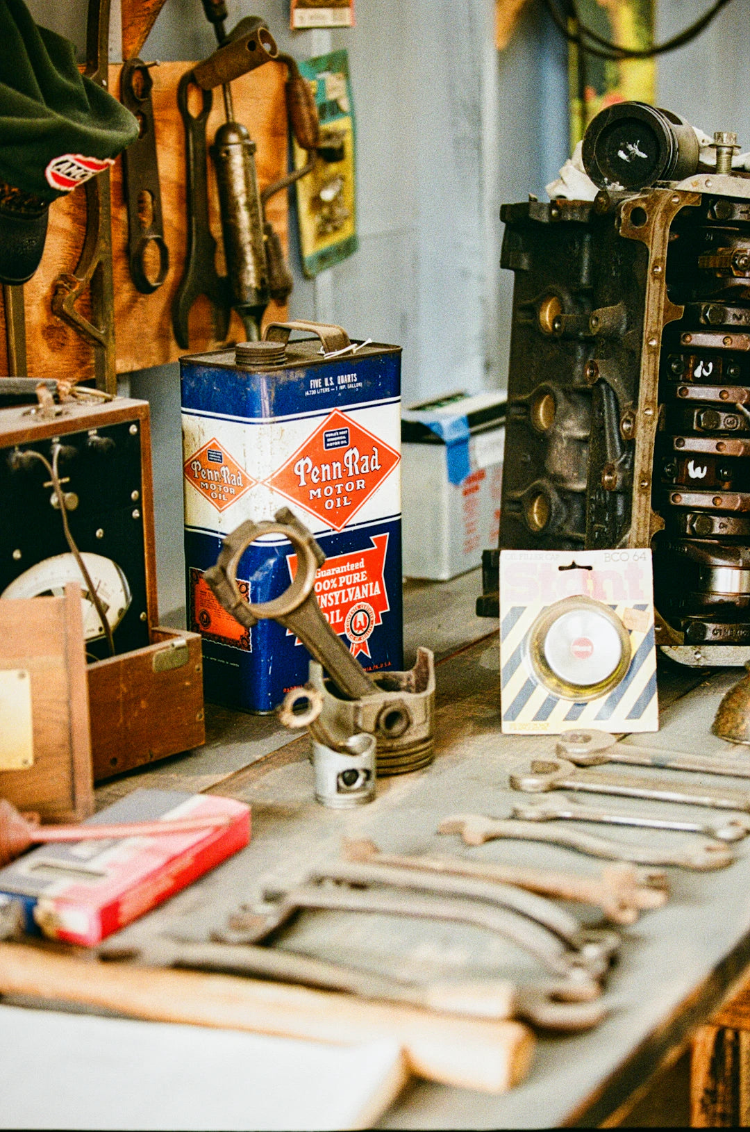Blue and white pennzoil motor oil can with red diamond logo featured in the journey of automotive tools article