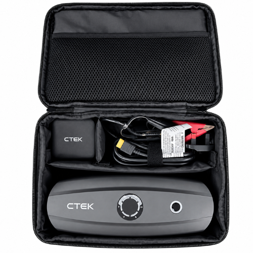 Black CTEK portable air compressor shown inside its open zippered carrying case, with accessories including a charger, cable, and red/black clamps visible.