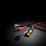 Black and red insulated test leads with a black connector housing an amber led indicator for ctek comfort connect eyelet m8 battery charging