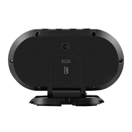 Back of black oval-shaped digital alarm clock with usb-c port and speaker grille in konnwei kw206 obd2 scanner product