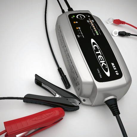 CTEK MXS 10 10-amp car battery charger size reference next to common objects, ideal for Indian vehicle owners
