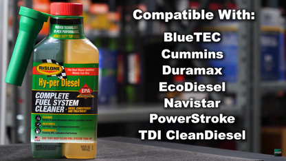 Rislone Hy-per Diesel Complete Fuel System Treatment kept on a table with a workshop in the background