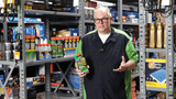 A green and black bottle of Rislone Hy-per Diesel engine oil additive with red cap labeled diesel stop for fuel system cleaning