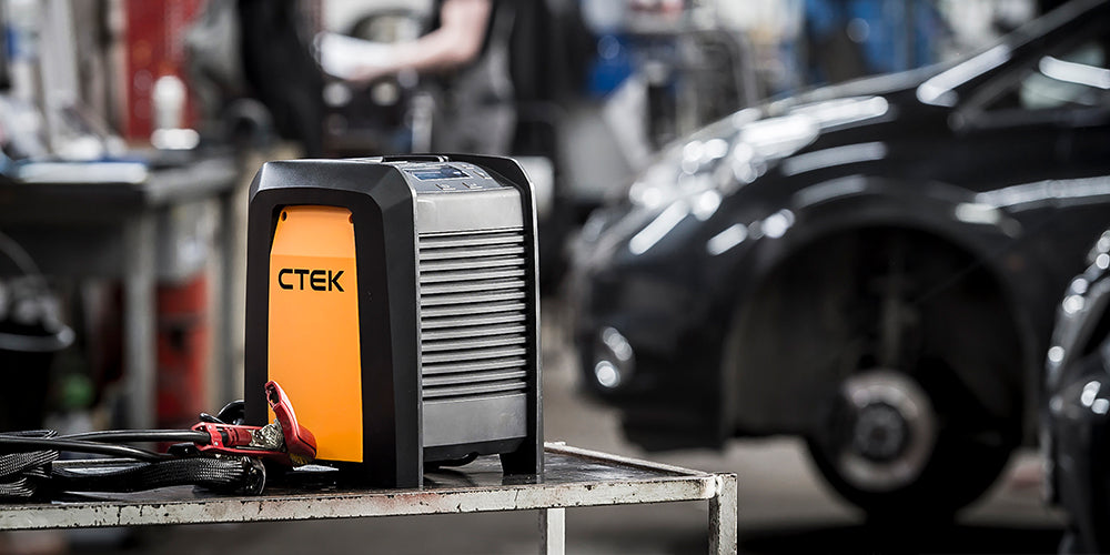 Orange and black ctek pro 60 12v 60a charger with sleek rectangular design for lead-acid and lifepo4 batteries