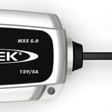 CTEK MXS 5.0 smart trickle charger maintaining a car battery in an Indian garage setup