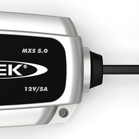 CTEK MXS 5.0 smart trickle charger maintaining a car battery in an Indian garage setup